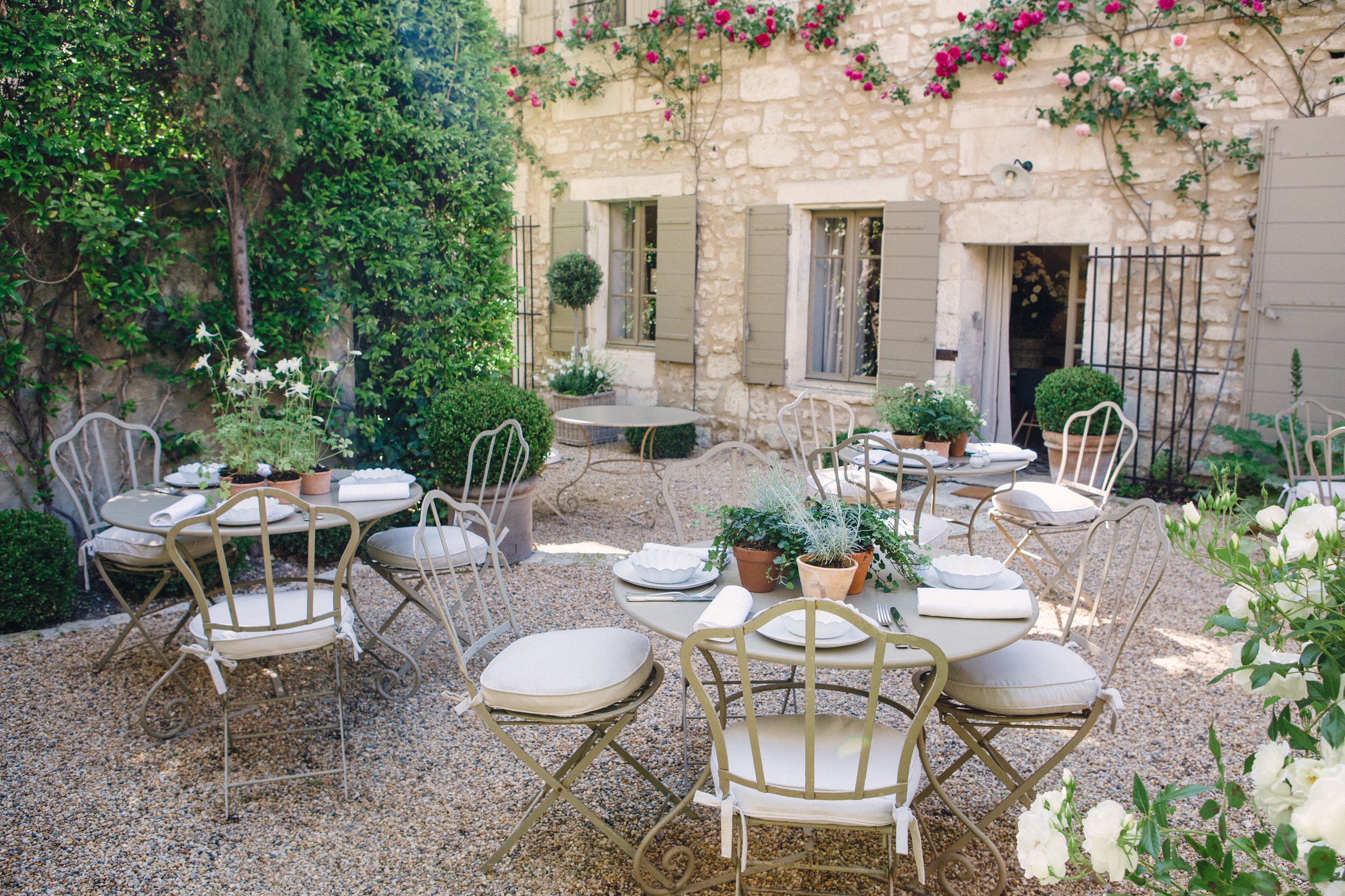 Hotel exterior or courtyard, Mediterranean boutique property — Carla Coulson